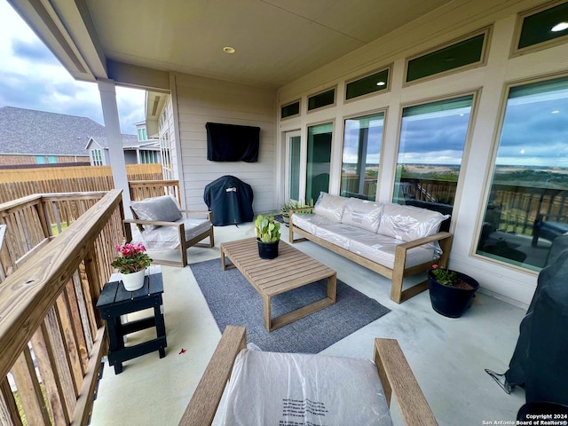 balcony with an outdoor hangout area