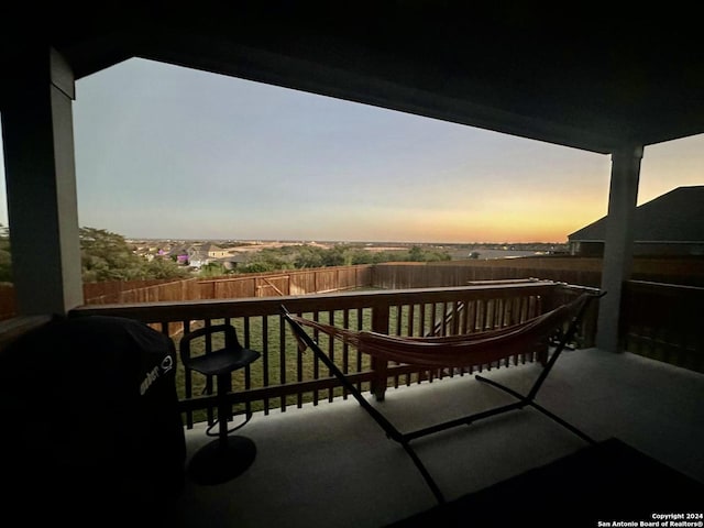 balcony at dusk with grilling area