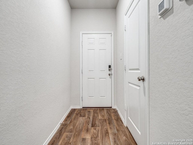 doorway to outside featuring dark hardwood / wood-style floors