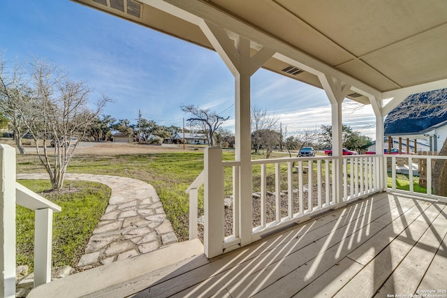 view of patio featuring a porch