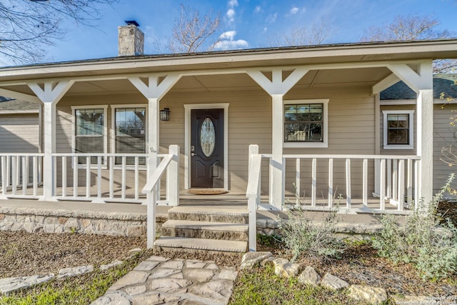 entrance to property with covered porch