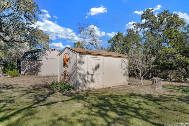 view of outdoor structure featuring a yard