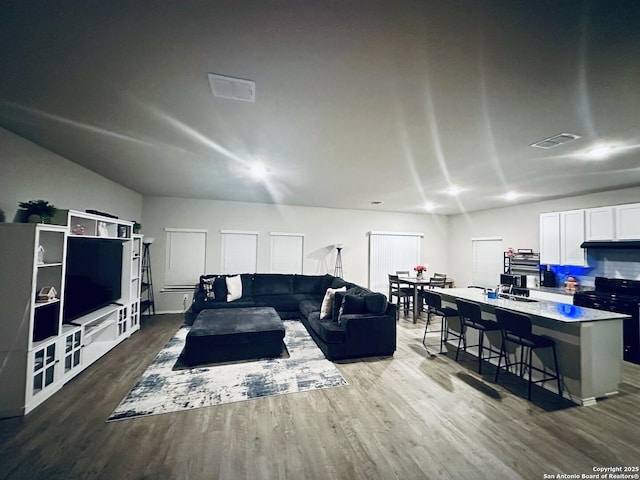 living room with hardwood / wood-style floors