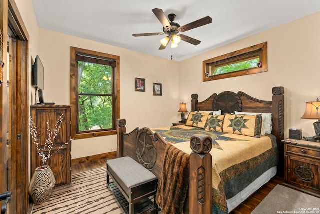 bedroom featuring ceiling fan and hardwood / wood-style floors