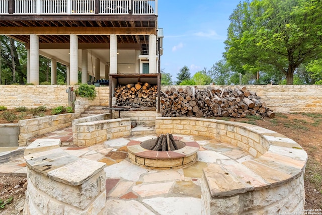 view of patio featuring an outdoor fire pit