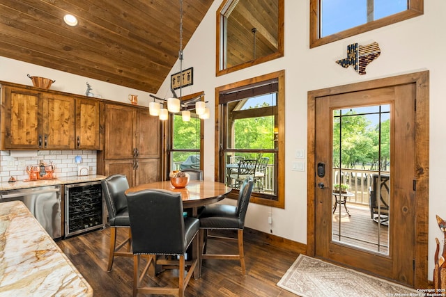 dining space with wood ceiling, high vaulted ceiling, wine cooler, and dark wood-type flooring