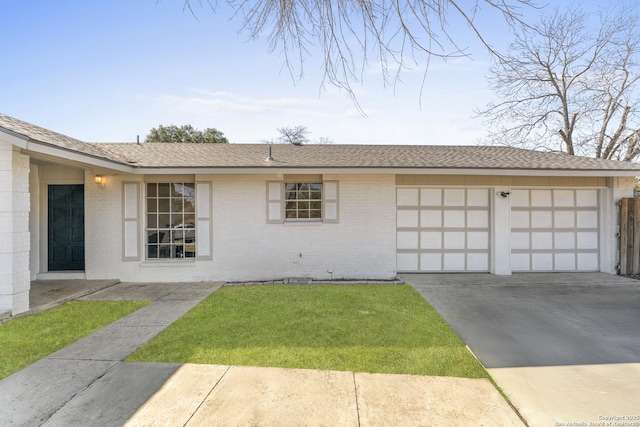 single story home with a garage