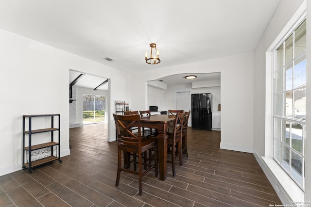 dining room featuring an inviting chandelier