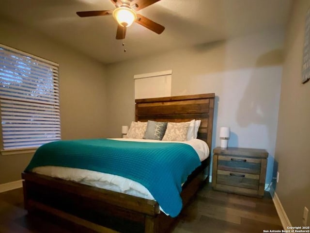 bedroom with ceiling fan and hardwood / wood-style flooring