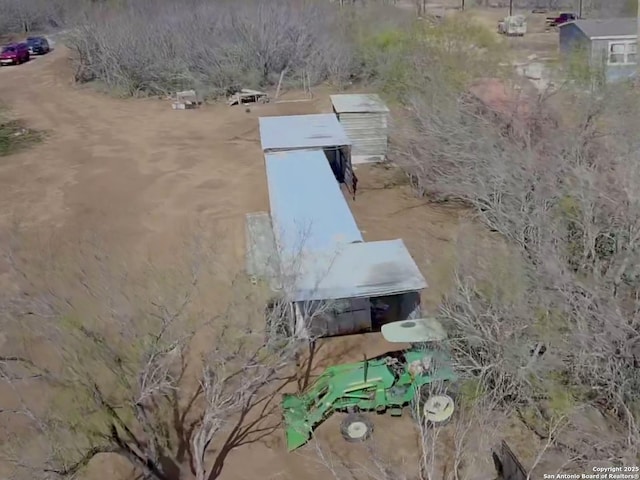 view of entry to storm shelter