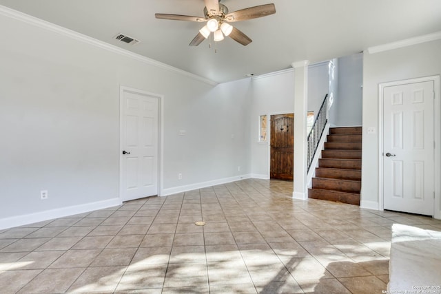 tiled spare room with crown molding and ceiling fan