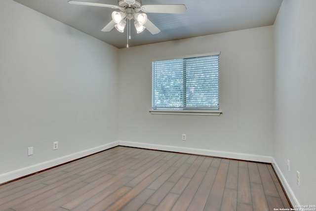 unfurnished room with ceiling fan and light hardwood / wood-style floors