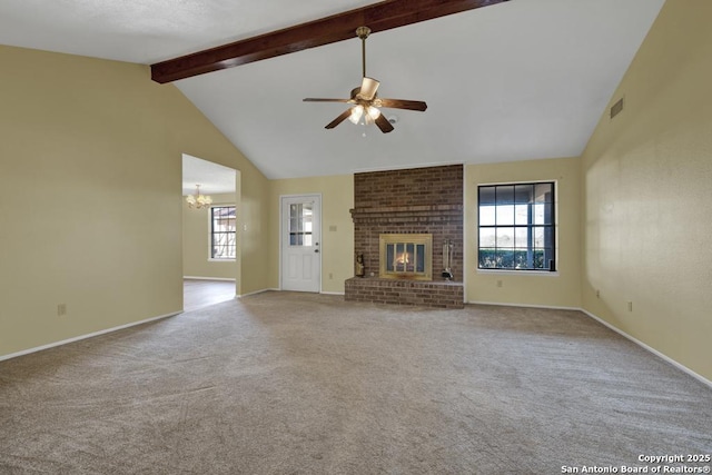 unfurnished living room with light carpet, a brick fireplace, high vaulted ceiling, beam ceiling, and ceiling fan with notable chandelier