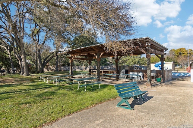 view of community featuring a yard and a gazebo