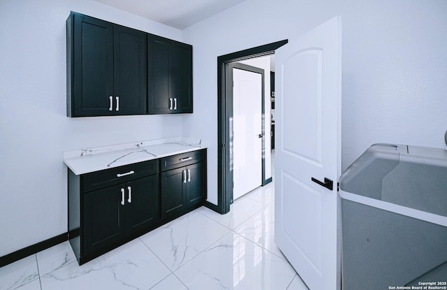 kitchen with light stone counters