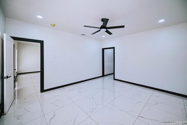 unfurnished room with ceiling fan