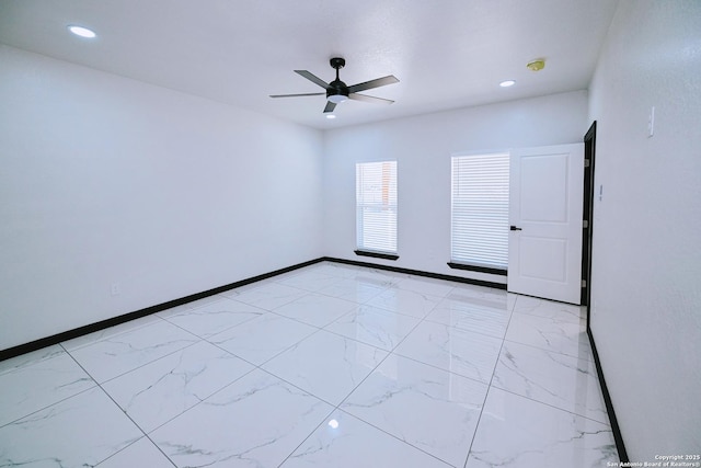 unfurnished room with ceiling fan