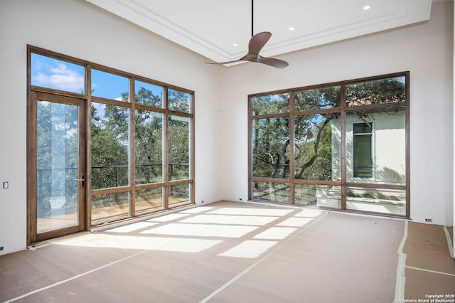 interior space featuring a wealth of natural light and ceiling fan