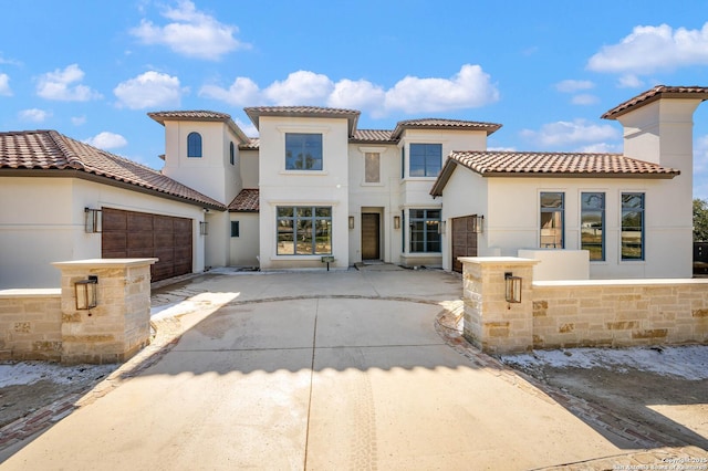 view of front of property featuring a garage