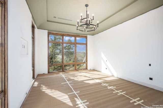 unfurnished dining area with an inviting chandelier