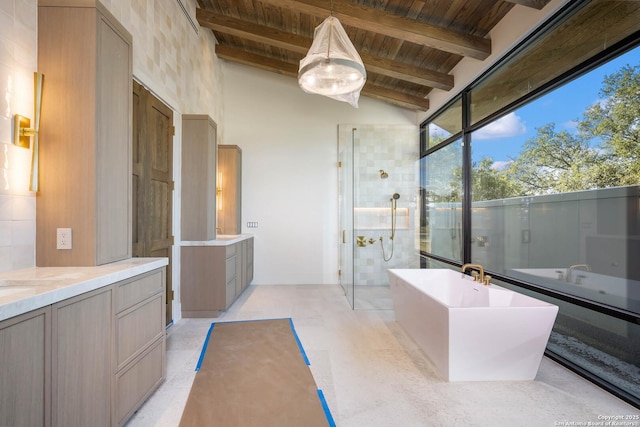 bathroom featuring wood ceiling, vanity, plus walk in shower, and lofted ceiling with beams