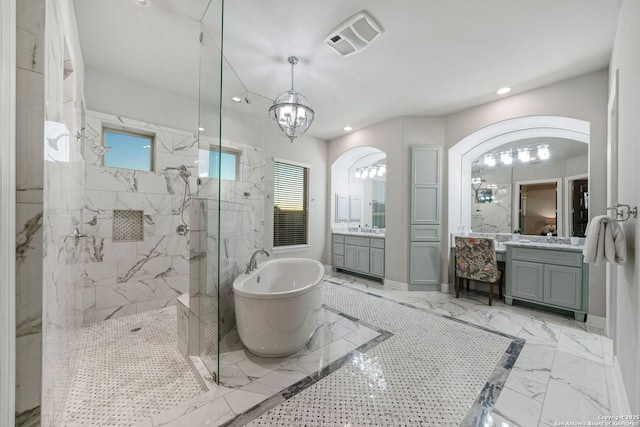 bathroom with vanity and plus walk in shower