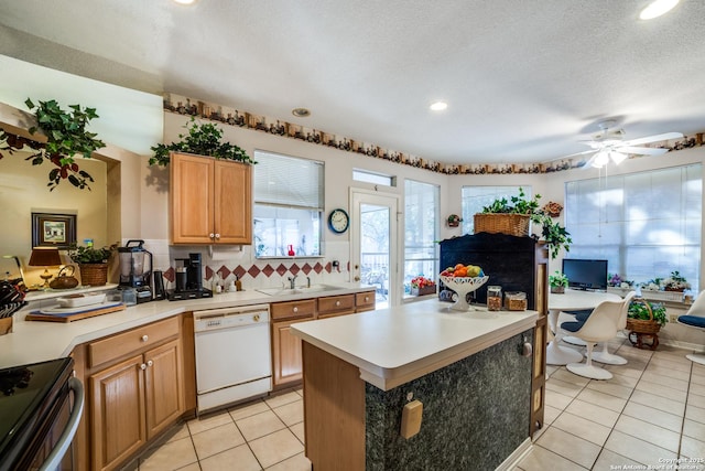 kitchen with dishwasher, light tile patterned flooring, stove, decorative backsplash, and a kitchen island