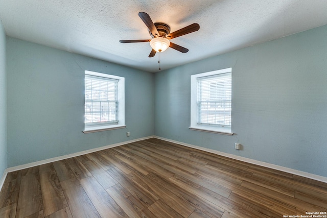 unfurnished room with hardwood / wood-style flooring, a textured ceiling, and ceiling fan