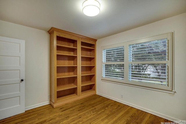 spare room featuring light hardwood / wood-style flooring