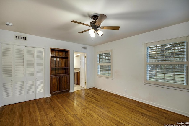 interior space with ceiling fan, light hardwood / wood-style flooring, and a healthy amount of sunlight