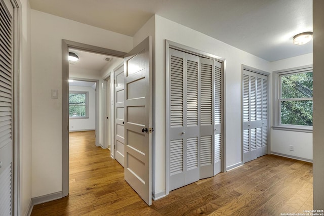 hallway featuring hardwood / wood-style floors