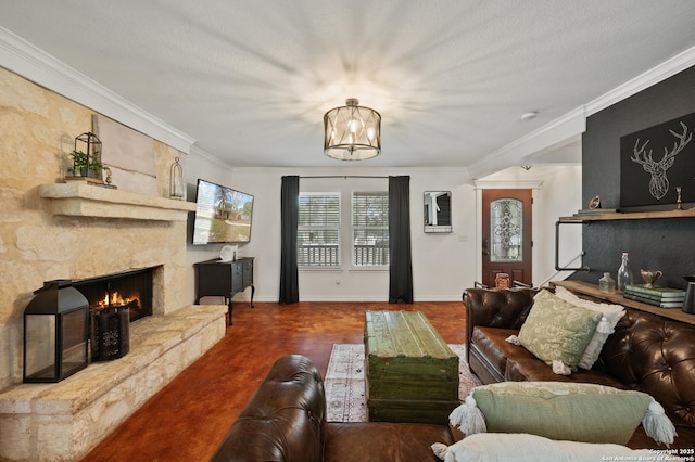 living room featuring a textured ceiling, an inviting chandelier, ornamental molding, and a stone fireplace