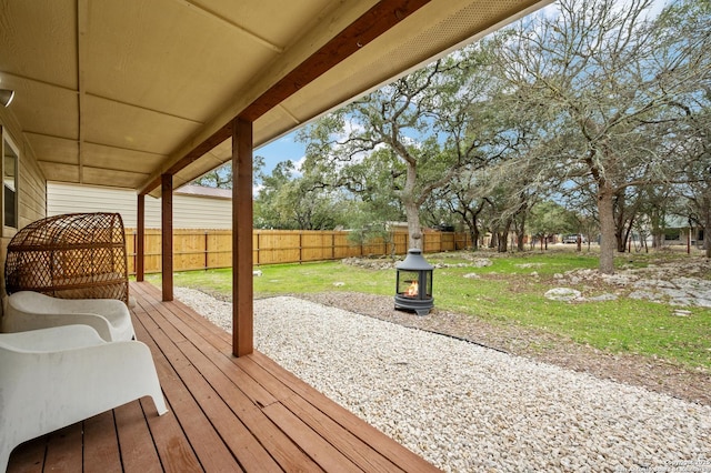 deck featuring a yard and a patio