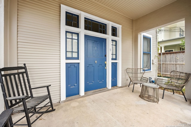 property entrance with a porch