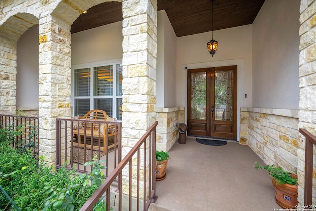 doorway to property featuring french doors