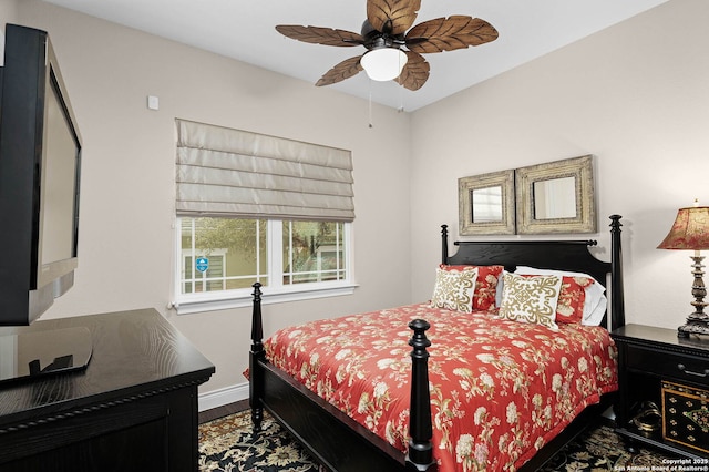 bedroom with hardwood / wood-style floors and ceiling fan