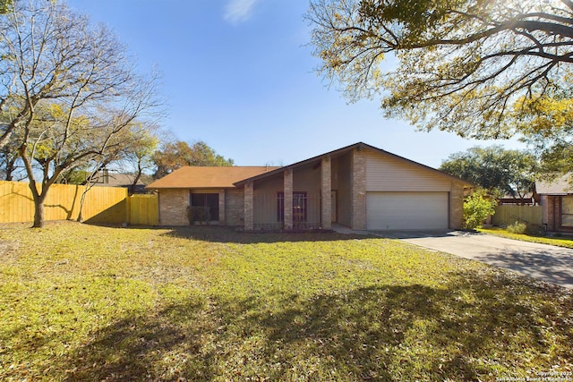 single story home with a front lawn and a garage