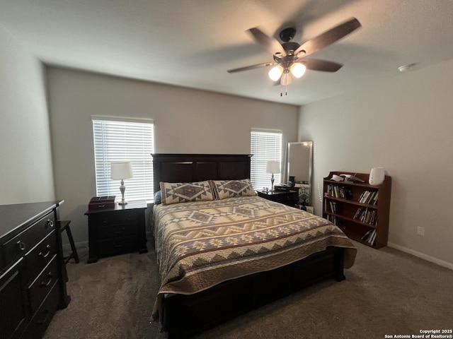 carpeted bedroom with ceiling fan and multiple windows