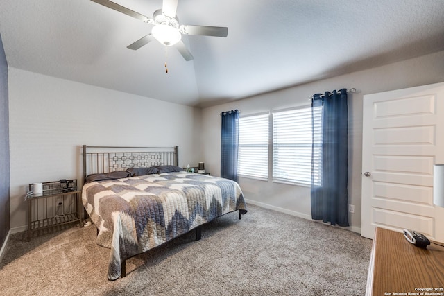 carpeted bedroom with lofted ceiling and ceiling fan