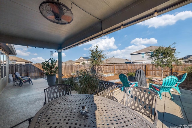 view of patio with ceiling fan