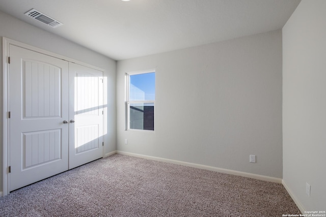 view of carpeted spare room