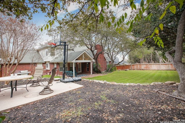 view of yard with a patio area