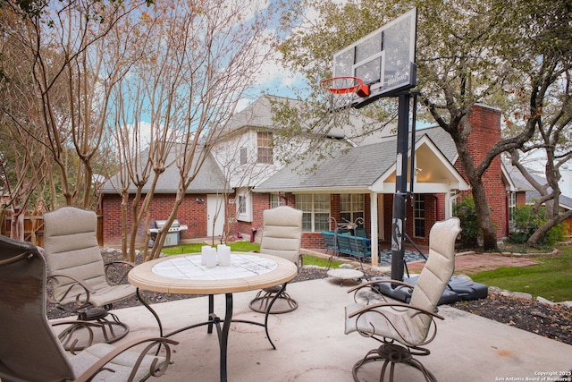 view of patio featuring a grill