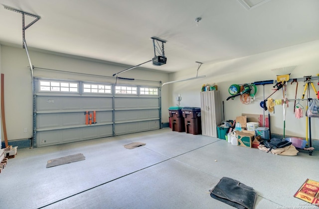 garage featuring a garage door opener