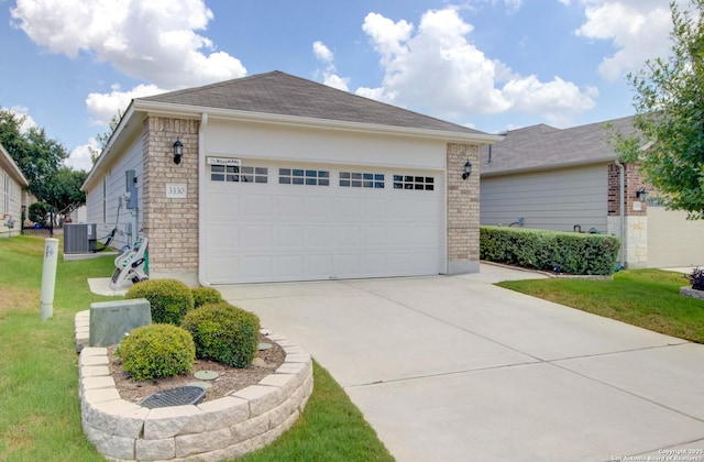 exterior space featuring a garage, central air condition unit, an outdoor structure, and a yard