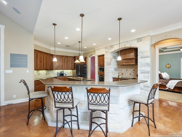 kitchen with premium range hood, a breakfast bar, and tasteful backsplash