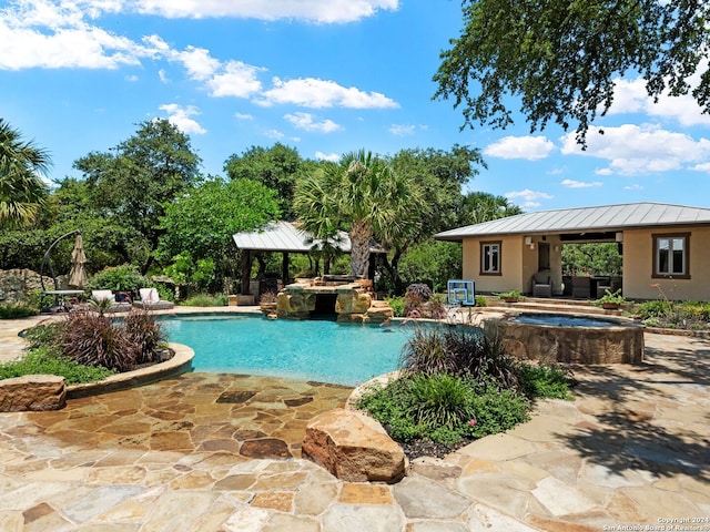 view of swimming pool with a gazebo, an in ground hot tub, and a patio