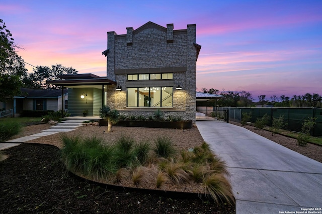 view of front of home with a carport