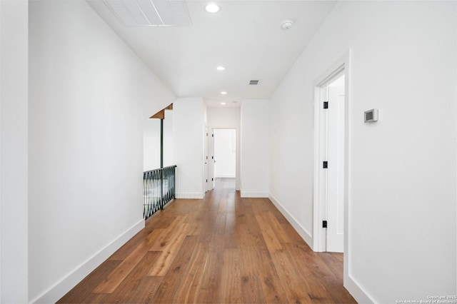 hall with light hardwood / wood-style flooring