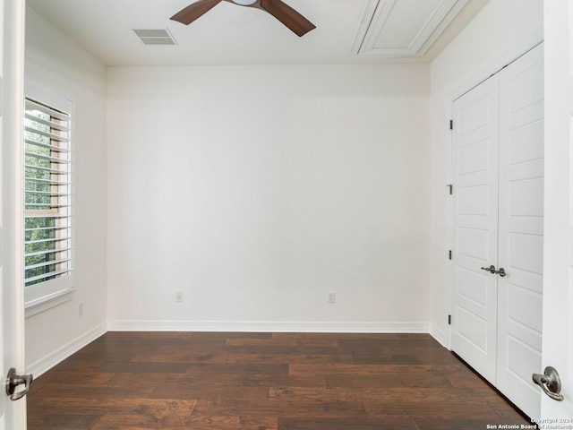 unfurnished room featuring dark hardwood / wood-style floors